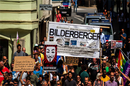 Protesters take part in a demonstration against the Bilderberg conference in Telfs, Austria.