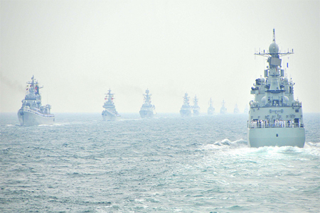 Naval warships are seen during a naval parade of the Chinese People's Liberation Army