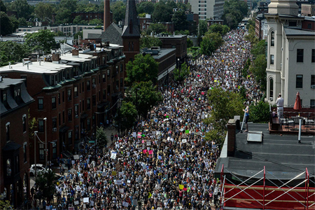 A large crowd of people march towards the Boston Commons to protest the Boston Free Speech Rally in Boston, MA, US, August 19, 2017