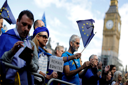 Demonstrators react in Parliament Square during the anti-Brexit 'People's March for Europe', in central London, Britain September 9, 2017