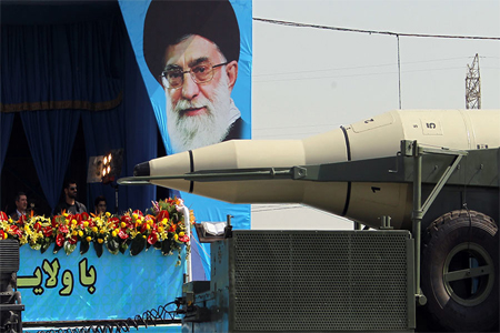 A military truck carries Sejil medium-range missile.