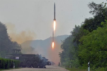 A fire drill of ballistic rockets by Hwasong artillery units of the KPA Strategic Force