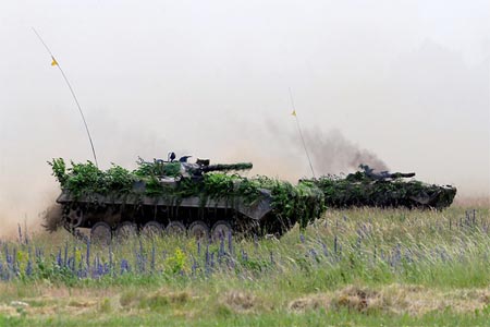 Poland's army tanks attend the final day of NATO Saber Strike exercises in Orzysz, Poland