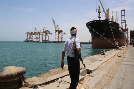 A soldier walks at Red Sea port of Hodeidah, Yemen, May 10, 2017.