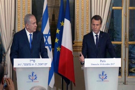 الرئيس الفرنسي إيمانويل ماكرون ورئيس الوزراء الإسرائيلي بنيامين نتنياهو