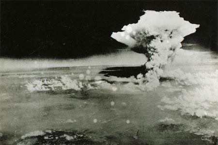 A mushroom cloud of the atomic bomb dropped by B-29 bomber Enola Gay over the city of Hiroshima