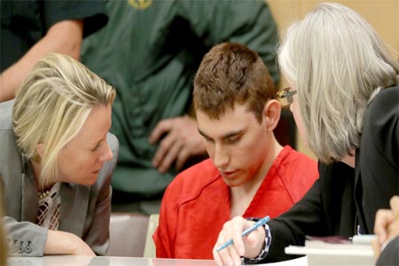 Nikolas Cruz, facing 17 murder charges in the mass shooting at Marjory Stoneman Douglas High School in Parkland, appears in court for a status hearing in Fort Lauderdale, Florida, February 19, 2018