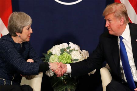 U.S. President Donald Trump shake hands with Britain's Prime Minister Theresa May