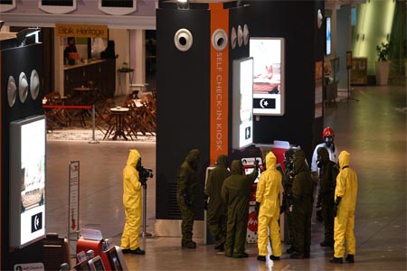 Members of Malaysia's Hazmat team conduct a decontamination of the Kuala Lumpur International Airport 2 (KLIA 2) on February 26, 2017.