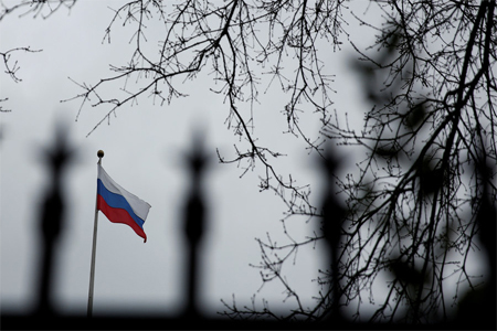 A Russian flag flies atop the Consulate General of the Russian Federation in Seattle, Washington, U.S., March 26, 2018.