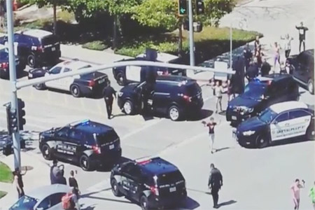 Officials are seen following a shooting at the headquarters of YouTube, in San Bruno, California, April 3, 2018