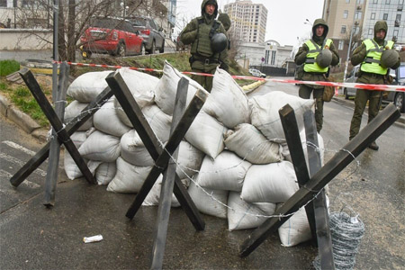 Ukrainian Interior Ministry officers and representatives of nationalist organizations block the entrance to the Russian Consulate General in Odessa due to the Russian presidential election