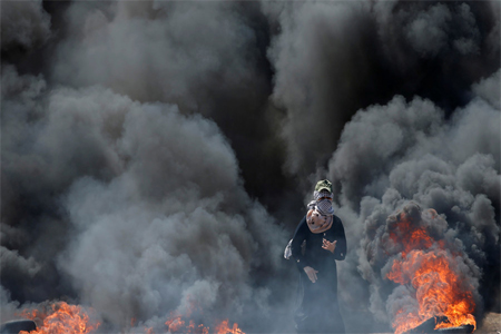 Protests against the US embassy move to Jerusalem and ahead of the 70th anniversary of Nakba at the Israel-Gaza border on May 14, 2018.