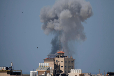 Smoke rises following an Israeli air strike in Gaza May 29, 2018.