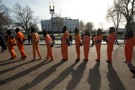 Protestors dressed as Guantanamo detainees gather in front of the White House. (File photo: Reuters)