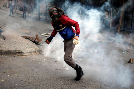 Police intervened as demonstrators attempted to form a human chain and shouted slogans against the government. (AP)