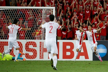 فرحة لاعبي الصين بالهدف الثاني في شباك أوزبكستان