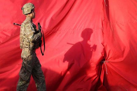 A U.S. soldier walks towards the site of a suicide attack in the heart of Kabul, Afghanistan. (File photo: Reuters)