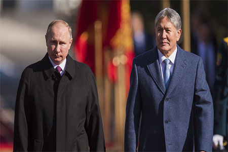 Russian President Vladimir Putin and President of Kyrgyzstan Almazbek Atambayev