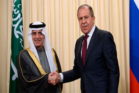 Russian Foreign Minister Sergey Lavrov (R) and his counterpart from Saudi Arabia Adel al-Jubeir