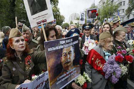 People take part in the Immortal Regiment march during the Victory Day celebrations in Kiev, Ukraine, May 9, 2017