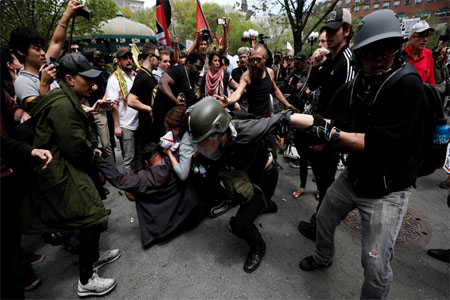 Demonstrators clash with people opposing their rally during a May Day protest in Union Square in New York City, U.S. May 1, 2017.